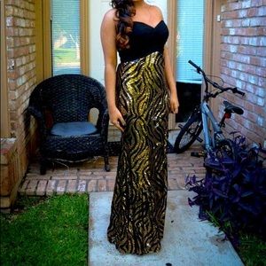 Beautiful gold animal sequined dress with a slit